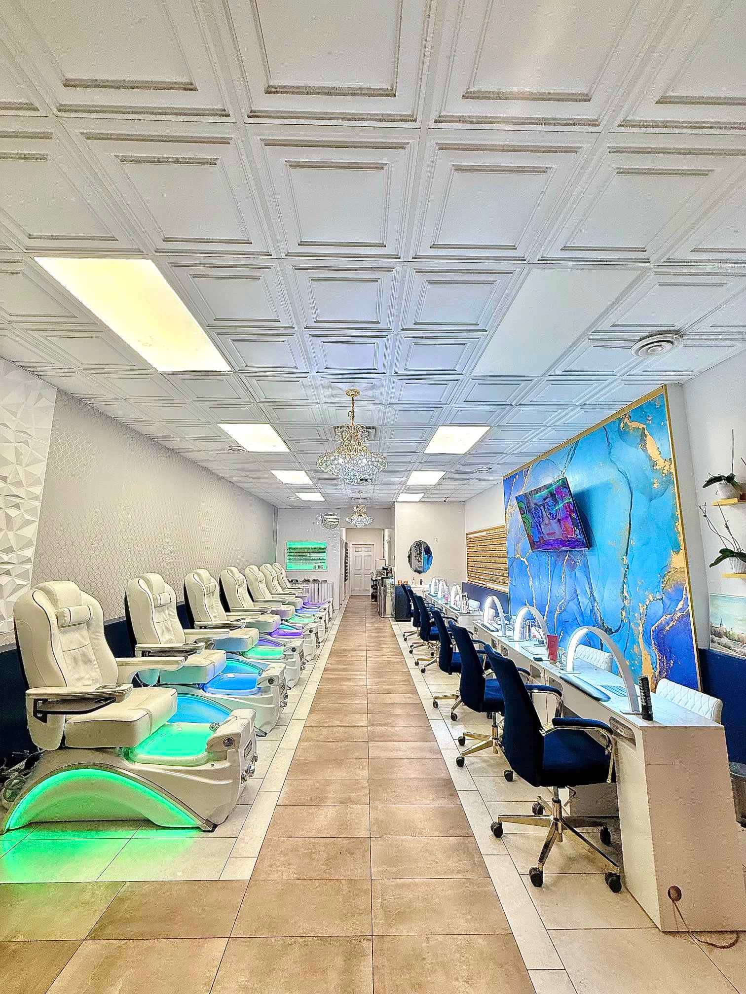 Interior of Q Nails Westgate with manicure stations and spa pedicure chairs